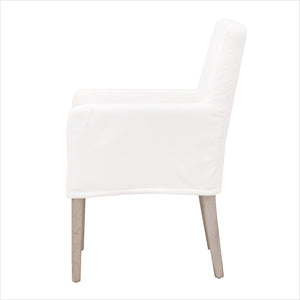 White slipcovered dining chair