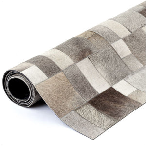 Grey leather area rug