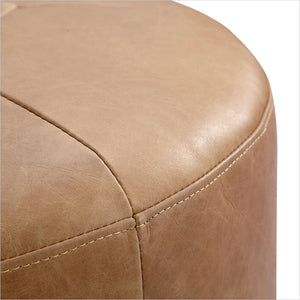 round leather ottoman