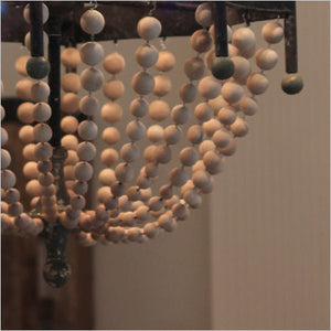 Cascading wood bead chandelier