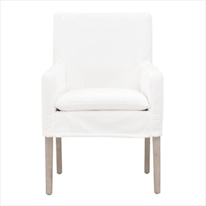 White slipcovered dining chair