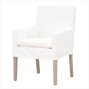 White slipcovered dining chair