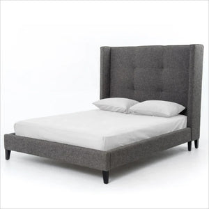 upholstered bed with tufting