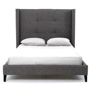 upholstered bed with tufting