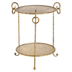 Round accent table in hammered iron with gold leaf finish